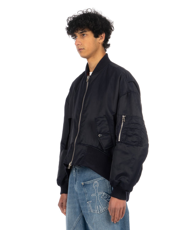 JW Anderson | Oversized Curved Hem Bomber Jacket Navy - Concrete