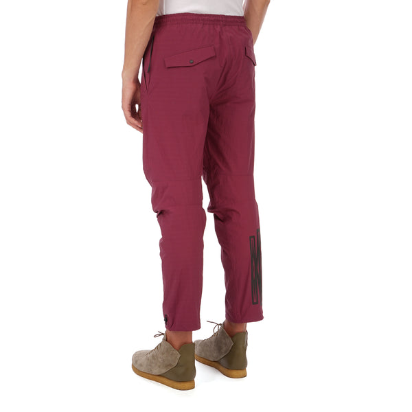 maharishi | Vegetable Dyed Asymmetric Trackpants Wine Red - Concrete