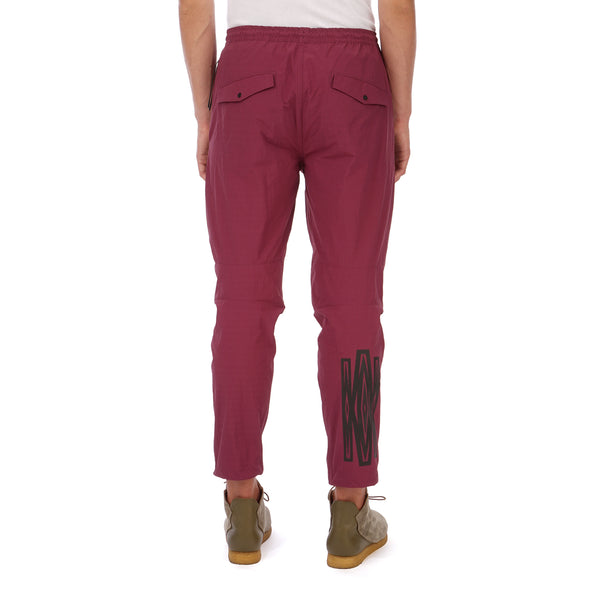 maharishi | Vegetable Dyed Asymmetric Trackpants Wine Red - Concrete